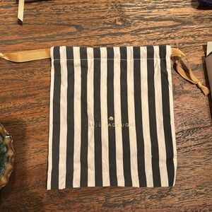 Lele Sadoughi dust bag